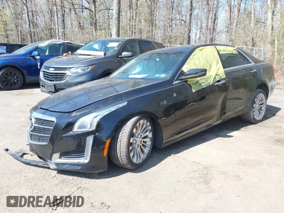 2014 Cadillac CTS Luxury RWD with VIN 1G6AR5SX4E0165254, listed as a IAAI auction lot 41938674 with 54,470 mi miles. Bid and sale history available at carsss.com. Image 2.