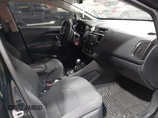 2013 Kia Rio SX with VIN KNADN4A38D6229948, listed as a IAAI auction lot 42007877 with 126,695 mi miles. Bid and sale history available at carsss.com. Image 5.