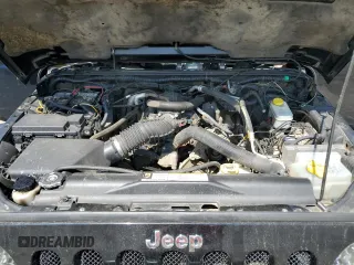 2011 Jeep Wrangler Sahara with VIN 1J4AA5D14BL542912, listed as a Copart auction lot 65158784 with 122,795 mi miles and Salvage Title. Bid and sale history available at DreamBid. Image 11.