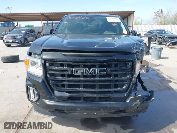 2022 GMC Canyon 2WD Elevation with VIN 1GTG5CEN5N1151794, listed as a IAAI auction lot 41876656 with 57,305 mi miles. Bid and sale history available at carsss.com. Image 13.