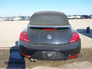 2014 Volkswagen Beetle 1.8T with VIN 3VW517AT4EM815243, listed as a IAAI auction lot 41245346 with 119,259 mi miles and . Bid and sale history available at DreamBid. Image 16.