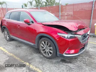 2019 Mazda CX-9 Grand Touring z VIN JM3TCADY3K0306761, wystawiony jako IAAI lot #41714778 z przebiegiem 86 846 mil mil oraz . Historia ofert i sprzedaży dostępna na DreamBid. Obrazek 1.