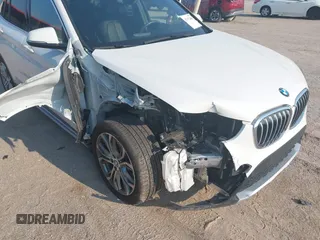 2016 BMW X1 xDrive28i z VIN WBXHT3Z37G4A48242, wystawiony jako IAAI lot #42473404 z przebiegiem 34 309 mil mil oraz . Historia ofert i sprzedaży dostępna na DreamBid. Obrazek 6.