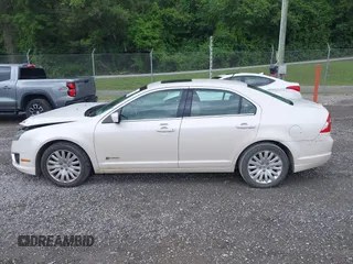 2010 Ford Fusion Hybrid with VIN 3FADP0L30AR200029, listed as a IAAI auction lot 42394846 with 192,634 mi miles and . Bid and sale history available at DreamBid. Image 14.