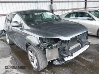 2015 Audi Q7 Premium Plus z VIN WA1LGAFE9FD031423, wystawiony jako IAAI lot #42318500 z przebiegiem 79 108 mil mil oraz . Historia ofert i sprzedaży dostępna na DreamBid. Obrazek 1.