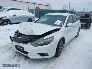 2016 Nissan Altima 2.5 SR with VIN 1N4AL3AP1GN383538, listed as a IAAI auction lot 41264765 with 129,836 mi miles. Bid and sale history available at carsss.com. Image 17.