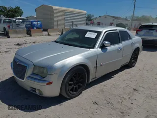 2007 Chrysler 300 C with VIN 2C3KA63H17H849672, listed as a IAAI auction lot 41800769 with 249,457 mi miles and . Bid and sale history available at carsss.com. Image 2.
