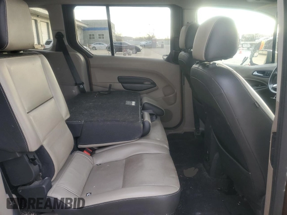 2014 Ford Transit Connect Titanium z VIN NM0GE9G72E1148012, wystawiony jako Copart lot #50765065 z przebiegiem 142 169 mil mil oraz Szkoda całkowita • Salvage title. Historia ofert i sprzedaży dostępna na DreamBid. Obrazek 11.