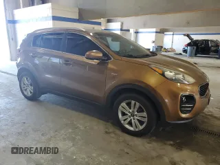 2017 Kia Sportage LX with VIN KNDPMCAC9H7157171, listed as a Copart auction lot 54885905 with 194,496 mi miles and Salvage Title. Bid and sale history available at DreamBid. Image 4.