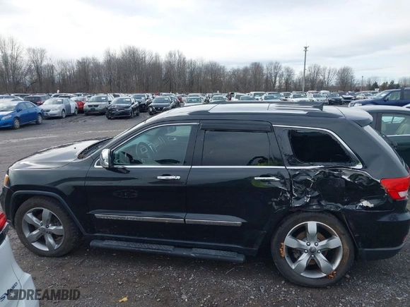 2013 Jeep Grand Cherokee Limited with VIN 1C4RJFBT9DC592257, listed as a IAAI auction lot 40955180 with 130,038 mi miles. Bid and sale history available at carsss.com. Image 14.