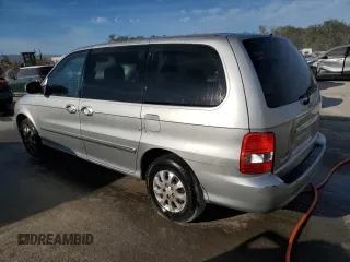 2005 Kia Sedona LX with VIN KNDUP132356769452, listed as a Copart auction lot 82835494 with 93,845 mi miles and Salvage Title. Bid and sale history available at carsss.com. Image 2.