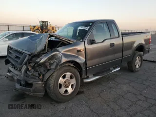 2005 Ford F-150 XL with VIN 1FTRF14525NB46069, listed as a Copart auction lot 79868054 with 108,703 mi miles and Salvage title. Bid and sale history available at DreamBid. Image 1.