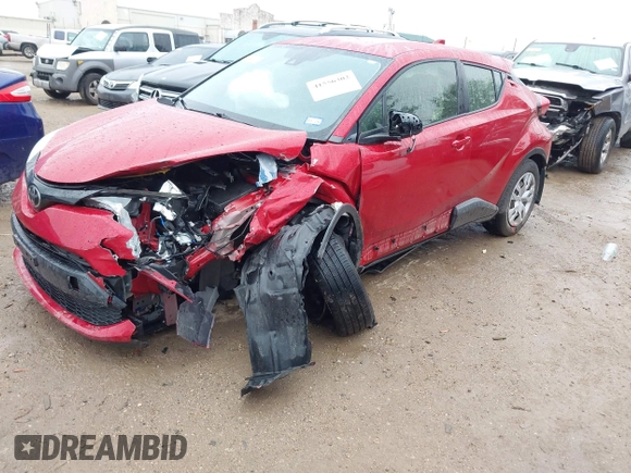 2020 Toyota C-HR LE with VIN JTNKHMBX4L1067648, listed as a IAAI auction lot 41556302 with 64,698 mi miles. Bid and sale history available at carsss.com. Image 6.