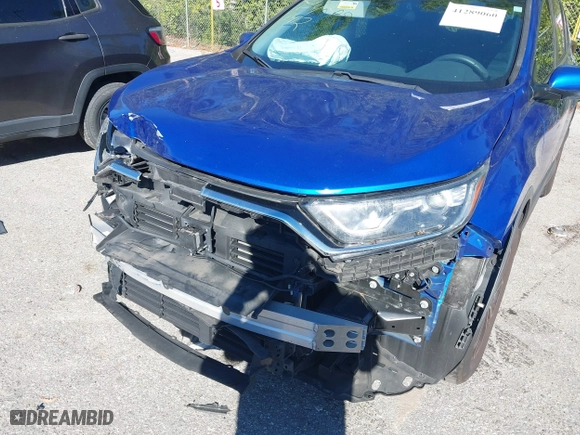 2020 Honda CR-V EX with VIN 7FARW1H57LE001412, listed as a IAAI auction lot 41289060 with 55,489 mi miles. Bid and sale history available at carsss.com. Image 6.