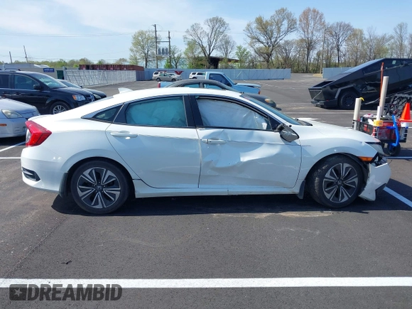 2016 Honda Civic Sedan EX-T with VIN 19XFC1F38GE004341, listed as a IAAI auction lot 41898993 with 234,259 mi miles. Bid and sale history available at carsss.com. Image 13.