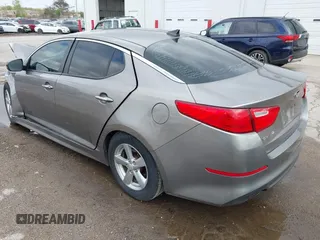 2015 Kia Optima LX z VIN 5XXGM4A78FG382856, wystawiony jako IAAI lot #42170669 z przebiegiem 101 964 mil mil oraz . Historia ofert i sprzedaży dostępna na DreamBid. Obrazek 3.