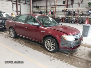 2008 Ford Taurus Limited with VIN 1FAHP28W28G153930, listed as a IAAI auction lot 42154827 with 243,386 mi miles. Bid and sale history available at carsss.com. Image 1.