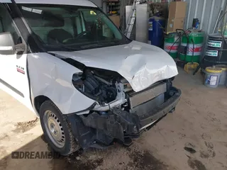 2019 Ram ProMaster City Cargo Tradesman z VIN ZFBHRFAB7K6M61484, wystawiony jako IAAI lot #41584872 z przebiegiem 63 558 mil mil oraz . Historia ofert i sprzedaży dostępna na DreamBid. Obrazek 6.