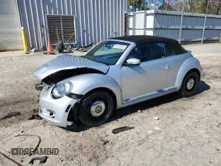 2013 Volkswagen Beetle 2.5L with VIN 3VW5X7AT9DM822329, listed as a Copart auction lot 46136265 with 68,672 mi miles and Salvage title. Bid and sale history available at DreamBid. Image 1.