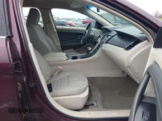 2011 Ford Taurus SE with VIN 1FAHP2DW7BG136988, listed as a IAAI auction lot 42002512 with 145,847 mi miles. Bid and sale history available at carsss.com. Image 5.