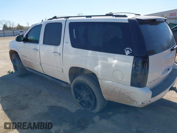 2013 GMC Yukon XL SLT z VIN 1GKS2KE77DR326758, wystawiony jako IAAI lot #41851754 z przebiegiem 144 976 mil mil oraz . Historia ofert i sprzedaży dostępna na DreamBid. Obrazek 3.