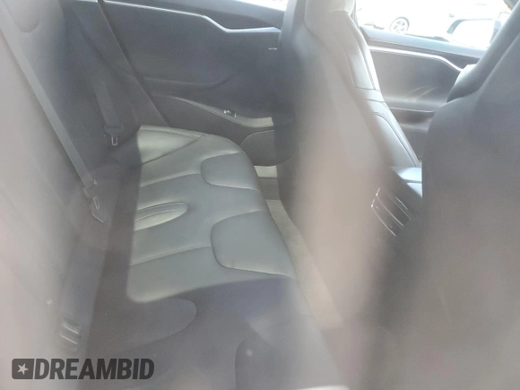 2016 Tesla Model S 90D z VIN 5YJSA1E29GF158774, wystawiony jako Copart lot #60143405 z przebiegiem Nie podano mil oraz Szkoda całkowita • Salvage title. Historia ofert i sprzedaży dostępna na DreamBid. Obrazek 10.