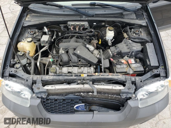 2006 Ford Escape XLT with VIN 1FMYU93106KC22952, listed as a Copart auction lot 56992534 with 183,473 mi miles and Salvage Title. Bid and sale history available at carsss.com. Image 12.