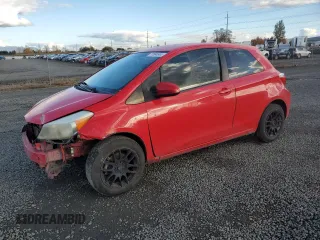 2013 Toyota Yaris L with VIN JTDJTUD30DD571316, listed as a Copart auction lot 77884944 with 243,010 mi miles and Salvage Title. Bid and sale history available at carsss.com. Image 1.