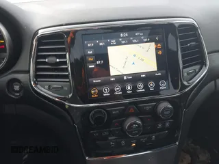 2019 Jeep Grand Cherokee Altitude with VIN 1C4RJEAG3KC572713, listed as a IAAI auction lot 41348420 with 133,735 mi miles and . Bid and sale history available at DreamBid. Image 21.