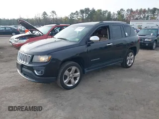 2014 Jeep Compass Limited with VIN 1C4NJDCB9ED549543, listed as a IAAI auction lot 41938699 with 195,973 mi miles. Bid and sale history available at carsss.com. Image 2.