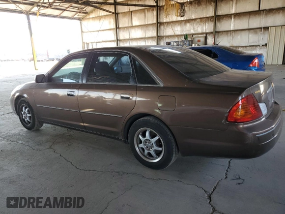 2000 Toyota Avalon XL z VIN 4T1BF28B3YU045264, wystawiony jako Copart lot #57519185 z przebiegiem 157 113 mil mil oraz Szkoda całkowita • Salvage title. Historia ofert i sprzedaży dostępna na DreamBid. Obrazek 2.
