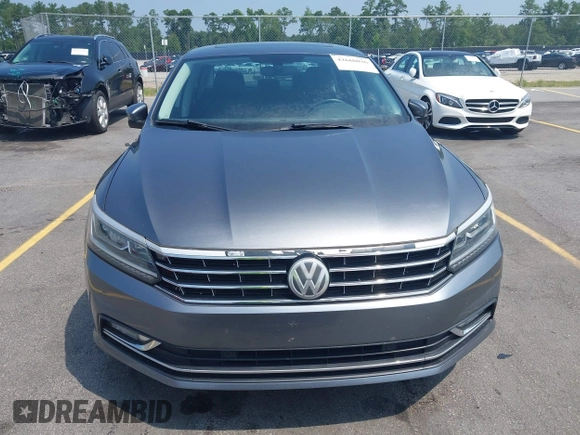 2017 Volkswagen Passat SE with VIN 1VWGT7A33HC058764, listed as a IAAI auction lot 42668036 with 76,732 mi miles and . Bid and sale history available at DreamBid. Image 12.
