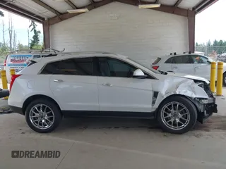 2012 Cadillac SRX Performance Collection with VIN 3GYFNBE36CS516347, listed as a IAAI auction lot 42530980 with 134,401 mi miles and . Bid and sale history available at DreamBid. Image 14.