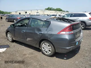 2013 Honda Insight z VIN JHMZE2H31DS000827, wystawiony jako Copart lot #60745645 z przebiegiem 172 694 mil mil oraz Szkoda całkowita • Salvage title. Historia ofert i sprzedaży dostępna na DreamBid. Obrazek 2.