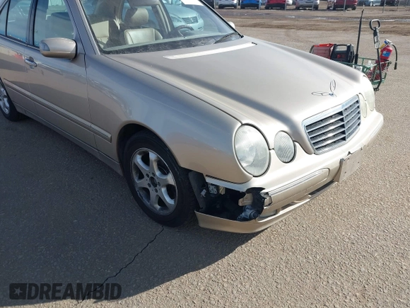 2002 Mercedes-Benz E-Class with VIN WDBJF65J92B479841, listed as a IAAI auction lot 41471955 with 203,527 mi miles. Bid and sale history available at carsss.com. Image 6.