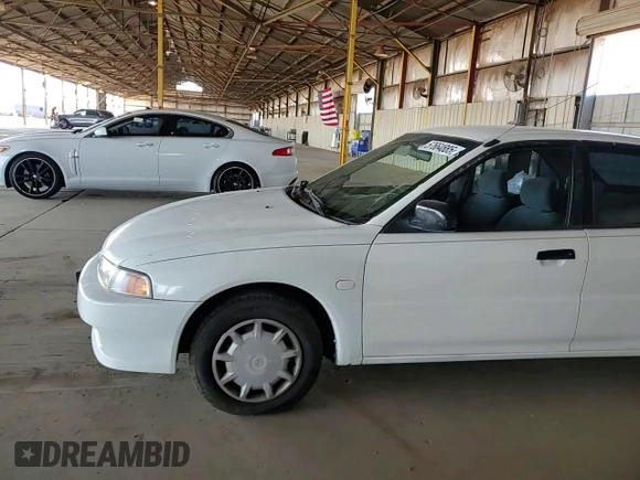 2001 Mitsubishi Mirage ES z VIN JA3AY26CX1U013535, wystawiony jako Copart lot #57664885 z przebiegiem 159 095 mil mil oraz Szkoda całkowita • Salvage title. Historia ofert i sprzedaży dostępna na DreamBid. Obrazek 13.