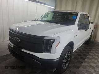 2023 Ford F-150 Lightning Pro z VIN 1FTVW1EL0PWG02840, wystawiony jako IAAI lot #42379448 z przebiegiem 52 710 mil mil oraz . Historia ofert i sprzedaży dostępna na DreamBid. Obrazek 4.