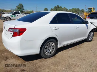 2014 Toyota Camry L with VIN 4T1BF1FK8EU381226, listed as a IAAI auction lot 41876832 with 79,025 mi miles and . Bid and sale history available at DreamBid. Image 4.