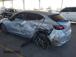 2018 Mazda 3 Touring with VIN 3MZBN1L31JM163466, listed as a IAAI auction lot 40777124 with 101,497 mi miles and . Bid and sale history available at carsss.com. Image 3.