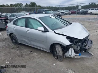 2023 Kia Rio S z VIN 3KPA24AD4PE620312, wystawiony jako IAAI lot #41368517 z przebiegiem 30 805 mil mil oraz . Historia ofert i sprzedaży dostępna na DreamBid. Obrazek 1.