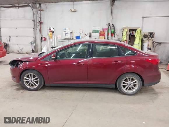 2015 Ford Focus SE with VIN 1FADP3F21FL270827, listed as a IAAI auction lot 42665015 with 162,745 mi miles and . Bid and sale history available at DreamBid. Image 15.