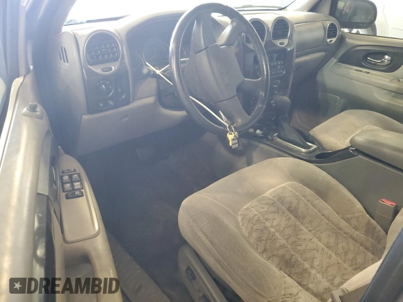 2004 GMC Envoy XL SLE with VIN 1GKET16S146120697, listed as a Copart auction lot 79917634 with 0 mi miles and Salvage Title. Bid and sale history available at carsss.com. Image 8.