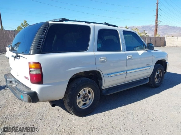 2002 GMC Yukon SLT with VIN 1GKEC13T32R256757, listed as a IAAI auction lot 41657945 with 331,831 mi miles. Bid and sale history available at carsss.com. Image 4.