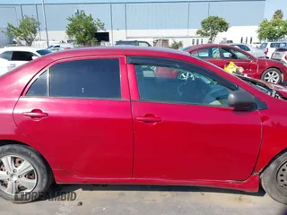 2009 Toyota Corolla with VIN 1NXBU40E99Z089505, listed as a IAAI auction lot 39832879 with 197,912 mi miles. Bid and sale history available at carsss.com. Image 13.