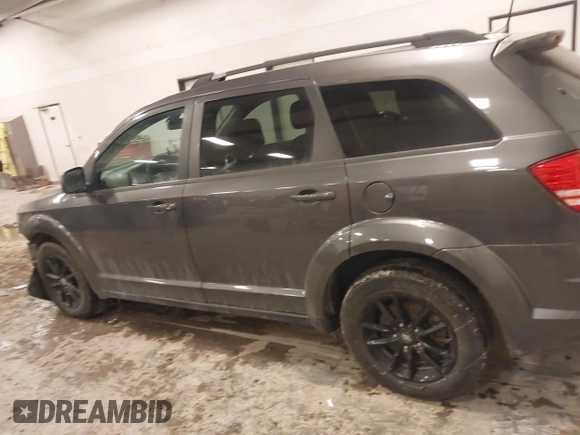 2020 Dodge Journey SE Value with VIN 3C4PDCAB7LT261279, listed as a IAAI auction lot 41564096 with 67,388 mi miles and . Bid and sale history available at DreamBid. Image 14.