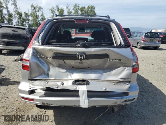 2011 Honda CR-V SE with VIN 5J6RE4H42BL122023, listed as a Copart auction lot 60573825 with 103,277 mi miles and Salvage title. Bid and sale history available at DreamBid. Image 6.