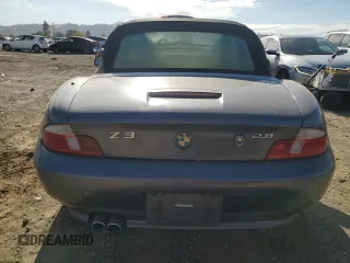 2000 BMW Z3 z VIN WBACH3345YLF71774, wystawiony jako Copart lot #75007354 z przebiegiem 170 924 mil mil oraz Szkody całkowita. Historia ofert i sprzedaży dostępna na DreamBid. Obrazek 6.