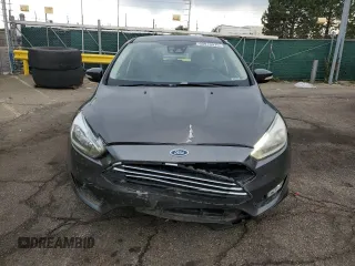 2016 Ford Focus Titanium z VIN 1FADP3N27GL329026, wystawiony jako Copart lot #60910475 z przebiegiem 98 794 mil mil oraz Szkoda całkowita • Salvage title. Historia ofert i sprzedaży dostępna na DreamBid. Obrazek 5.