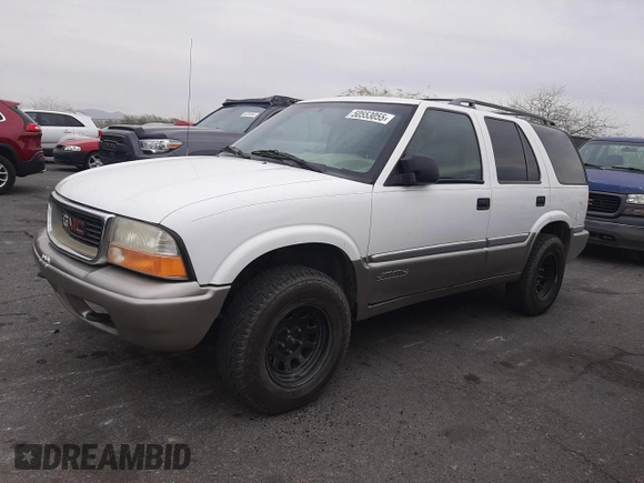 1999 GMC Jimmy SLE with VIN 1GKDT13W1X2551085, listed as a Copart auction lot 50553055 with 189,974 mi miles and Salvage Title. Bid and sale history available at carsss.com. Image 1.