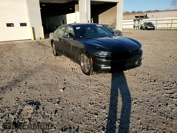 2019 Dodge Charger SXT with VIN 2C3CDXJG1KH757949, listed as a Copart auction lot 82231714 with 75,985 mi miles and Salvage Title. Bid and sale history available at DreamBid. Image 10.